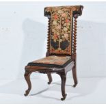 Victorian walnut prie dieu, with wool work upholstery to the back and seat,