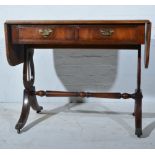 Regency style mahogany side table, box strung ebony outline, two frieze drawers,