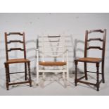 Painted beech and cane ladderback rocking chair.