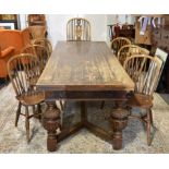 Large Continental oak refectory style dining table, with pull out extensions,