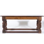 Joined oak refectory table, rectangular boarded top with cleated ends, plain frieze,