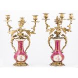 Pair of French porcelain and gilt metal candelabra, each with three scrolled branches,