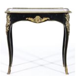 Louis XVI style writing table, ebonised and with brass mounts,