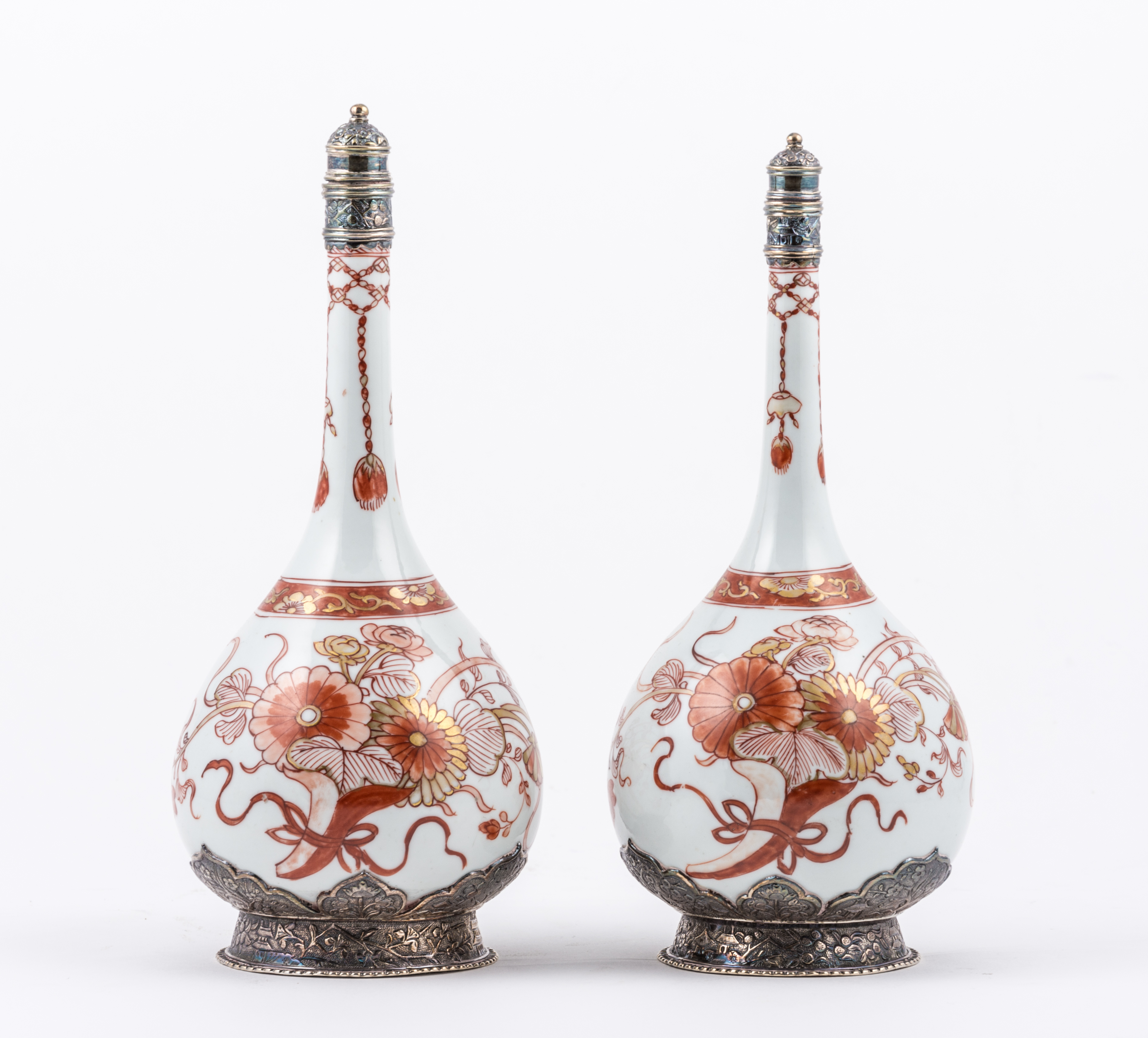 Near pair of Imari porcelain bottles, probably Edo, painted with floral sprays,