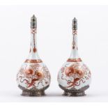 Near pair of Imari porcelain bottles, probably Edo, painted with floral sprays,