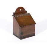 George III boarded oak candle box, slope front, studded leather hinge, width 22cm, height 34cm.