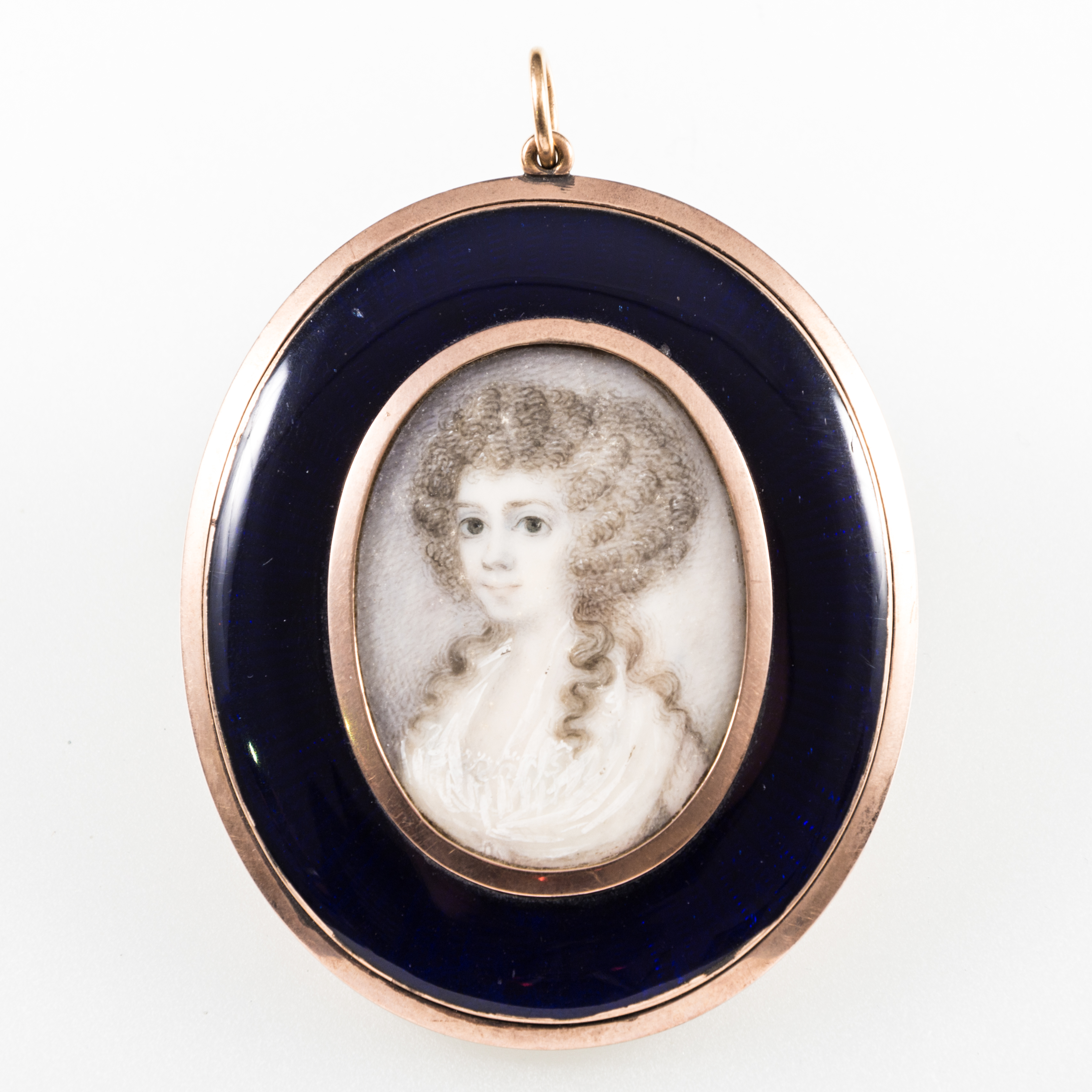 Follower of Richard Cosway A young lady, bust length, oval portrait miniature,