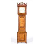 Oak and mahogany loncase clock, the hood with swan-neck pediment, fluted columns,