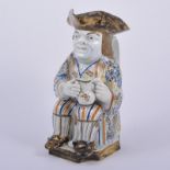 Pearlware Toby jug, Ralph Wood type, designed as Mr Toby wearing a tricorn hat, seated,