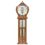 ROYAL POLYTECHNIC BAROMETER Oak cased barometer by Joseph Davis & Co.