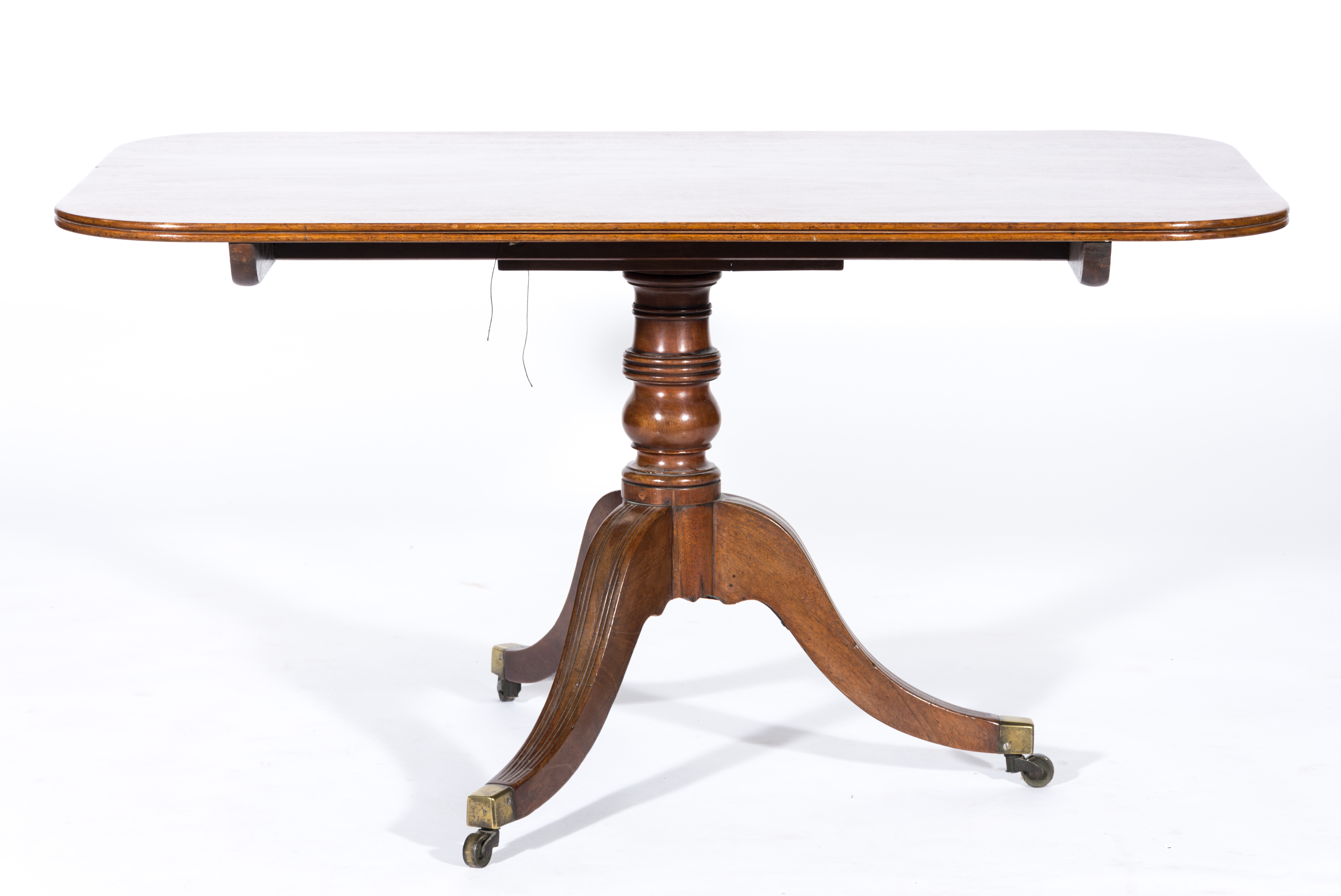 George IV mahogany breakfast table, rectangular tilt top with rounded corners, reeded edge,