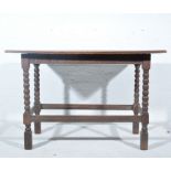 Joined oak sidetable, rectangular boarded top, bobbin turned legs, joined by carved rails,