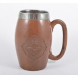 A Second World War RAF tankard, carved oak body with removable white metal lining,