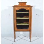 Late Victorian mahogany music cabinet, rectangular top with raised back, satinwood cross-banding,