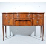 Sheraton style mahogany sideboard, serpentine outline, with cross banding and box stringing,