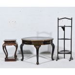 Chinese lacquered occasional table with a shaped circular top, cabriole legs and paw feet,