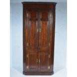 Victorian oak free-standing corner cupboard, dentil and cavetto moulded cornice, plain frieze,