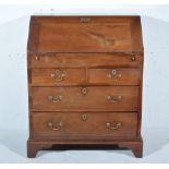 Georgian mahogany bureau, fall front enclosing an interior fitted with well,