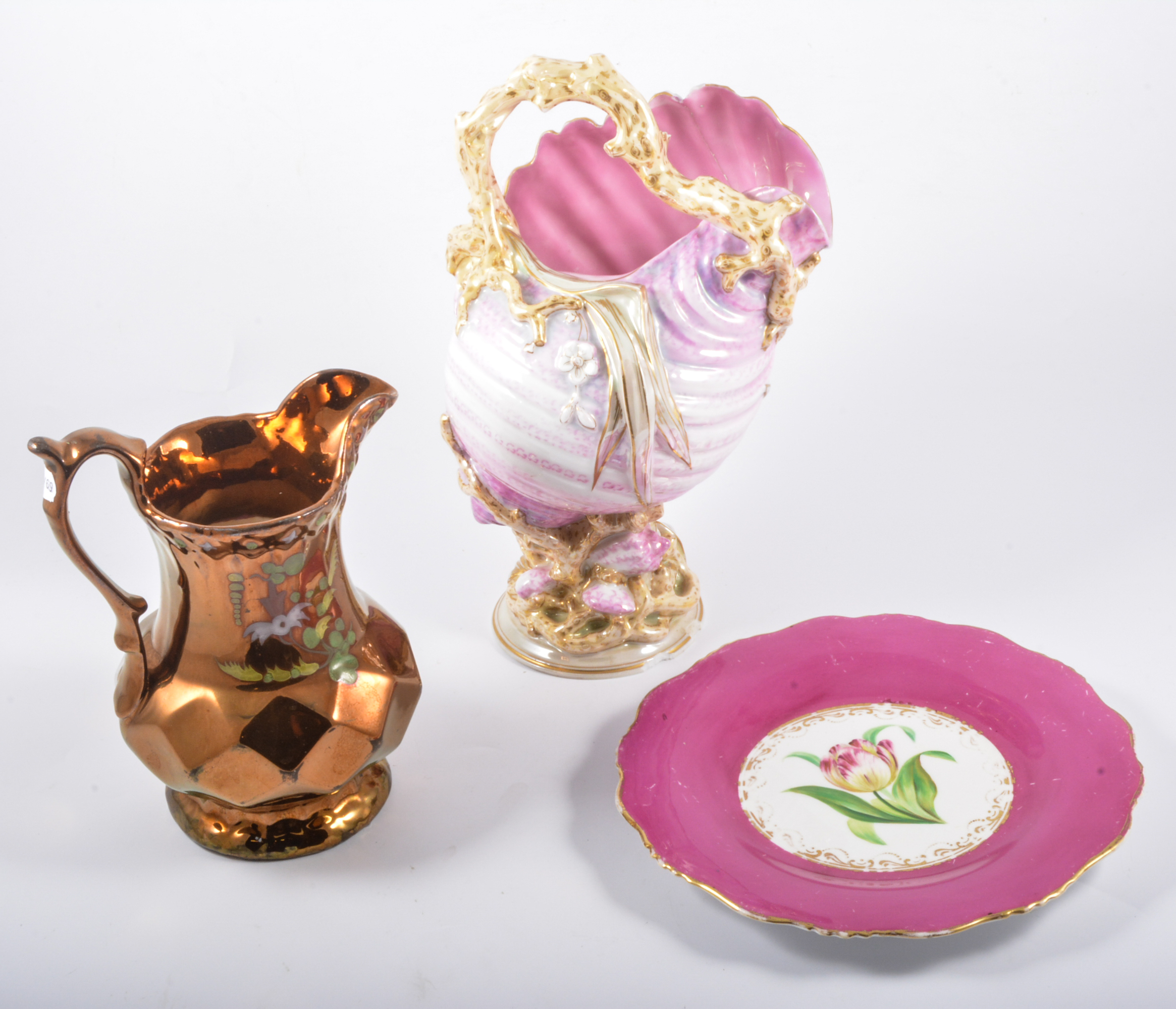 A pottery shell jug, copper luster pottery, pink part desert service and other ceramics.