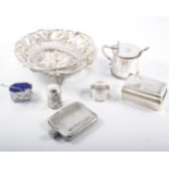 Silver drum mustard beaded outlines; silver salt and pepper with blue glass liners; napkin ring;