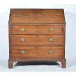 George III oak bureau, fall front enclosing interior fitted with a cupboard,