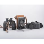 Vintage cameras and accessories, quantity in one box.