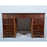 Early Victorian mahogany small partner's desk, rectangular top,