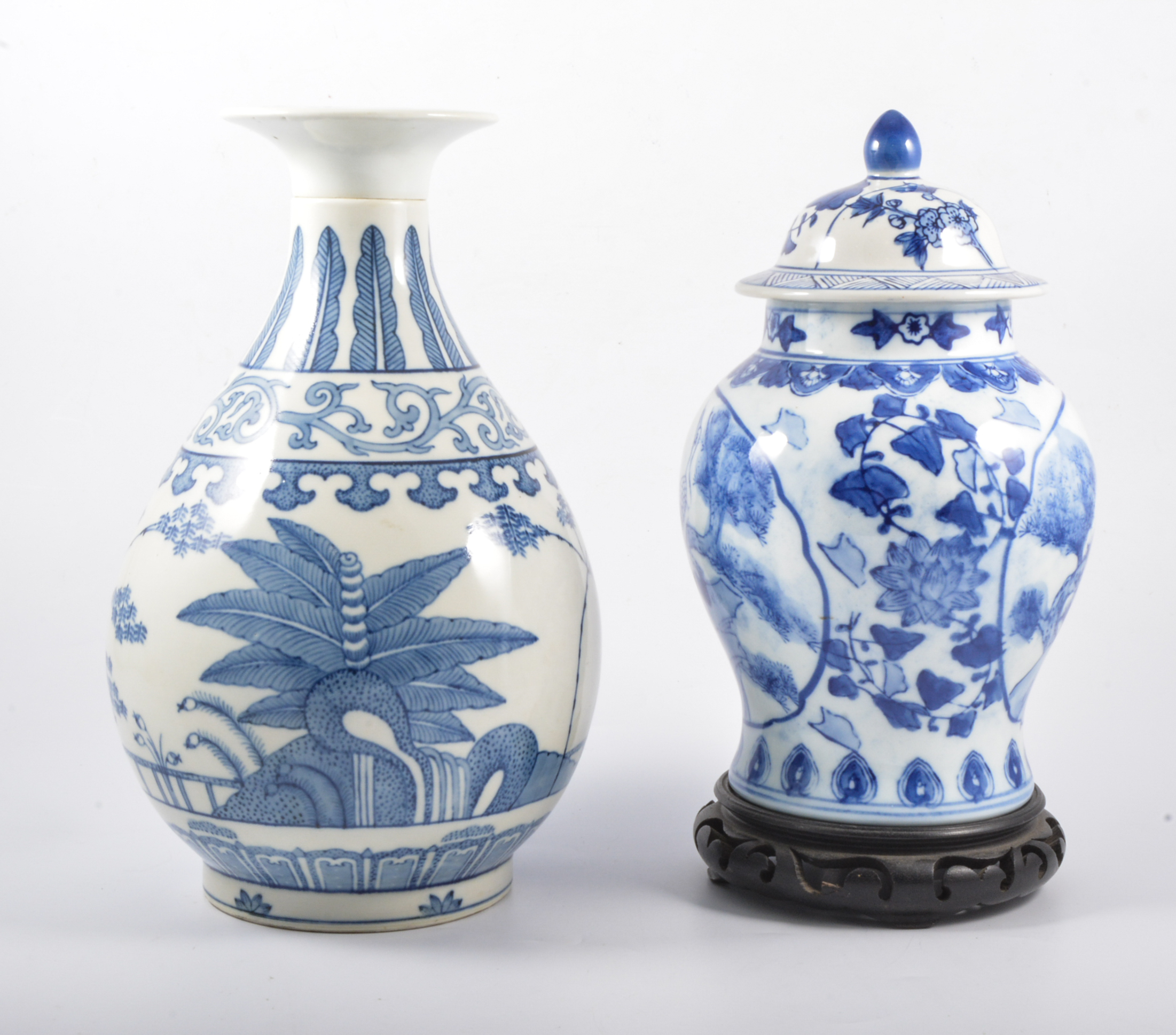 Chinese blue and white vase decorated with a palm tree, 6 character mark, 29cm, two Chinese bowls,