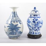 Chinese blue and white vase decorated with a palm tree, 6 character mark, 29cm, two Chinese bowls,