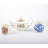 Tray of commemorative china, including a teapot ribbon plates and mugs.
