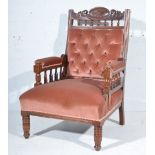 Victorian walnut armchair, carved and fluted frame, button upholstered back, turned legs,