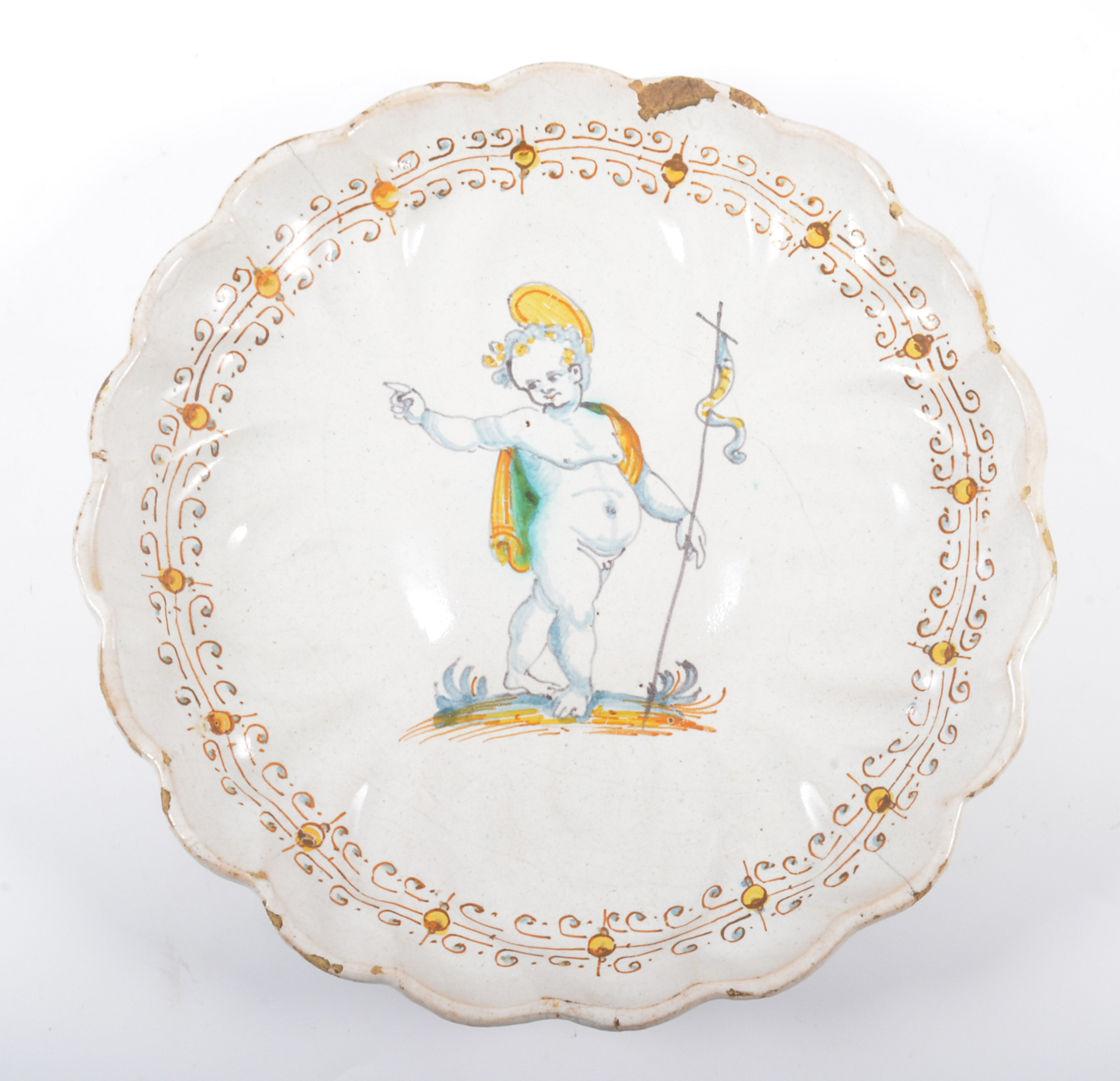 A Delft polychrome shallow dish, with a child baptise, English, late 17th Century style,