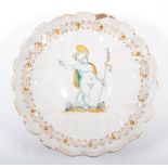 A Delft polychrome shallow dish, with a child baptise, English, late 17th Century style,