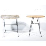 Contemporary folding occasional table, with circular rattan top, retailed by Habitat,