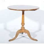 19th Century elm table, circular tilt top, turned column, tripod legs, diameter 65cm, height 66cm.