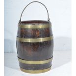 Coopered oak barrel, now a circular stick stand, 42cm; and brass stair rods.