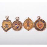 Four 9 carat yellow gold and enamel medallions,