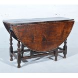 Joined oak gateleg table, in part 18th Century, oval top with two fall leaves, single frieze drawer,