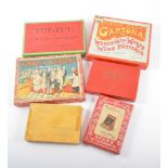 A box of vintage games, F H Ayres Table Croquet, bone dominoes,
