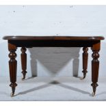 Victorian mahogany wind-out dining table, rectangular top with rounded ends, moulded edge,