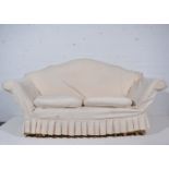 1930s settee, shaped back, scrolled arms, loose seat cushions now with loose cotton covers,