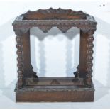 Victorian carved oak stick stand, bobbin turned supports, plinth base, width 62cm, depth 27cm,