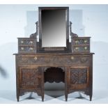 Victorian carved oak dressing table rectangular bevelled plate above trinket drawers,