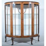 1940's walnut bow front china cabinet, glazed panels, cabriole legs, width 106cm, depth 40cm,