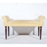 Mahogany upholstered banquette, with scrolled raised sides, turned supports, W123cm x D50cm x H60cm.