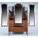 Edwardian walnut dressing table with a long rectangular bevelled mirror,