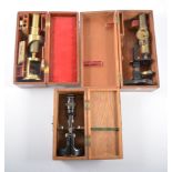 Three microscopes, a 16cm C Baker of London student microscope in oak case,