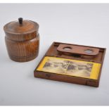 Walnut box stereoscope, with a small collection of cards, 19cm; together with an oak tobacco jar,