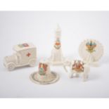 A collection of crested china, novelty animals and figures and objects, some with factory marks,