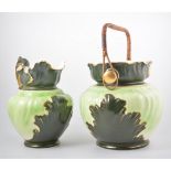 A vintage two tone green wash set comprising two wash bowls, jug and slop bucket with cane handle,